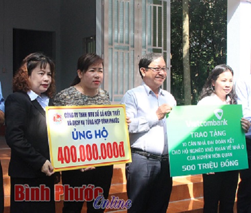 Xổ số Kiến thiết Bình Phước: Nguyên Chủ tịch nước Nguyễn Minh Triết dự lễ bàn giao nhà Đại đoàn kết